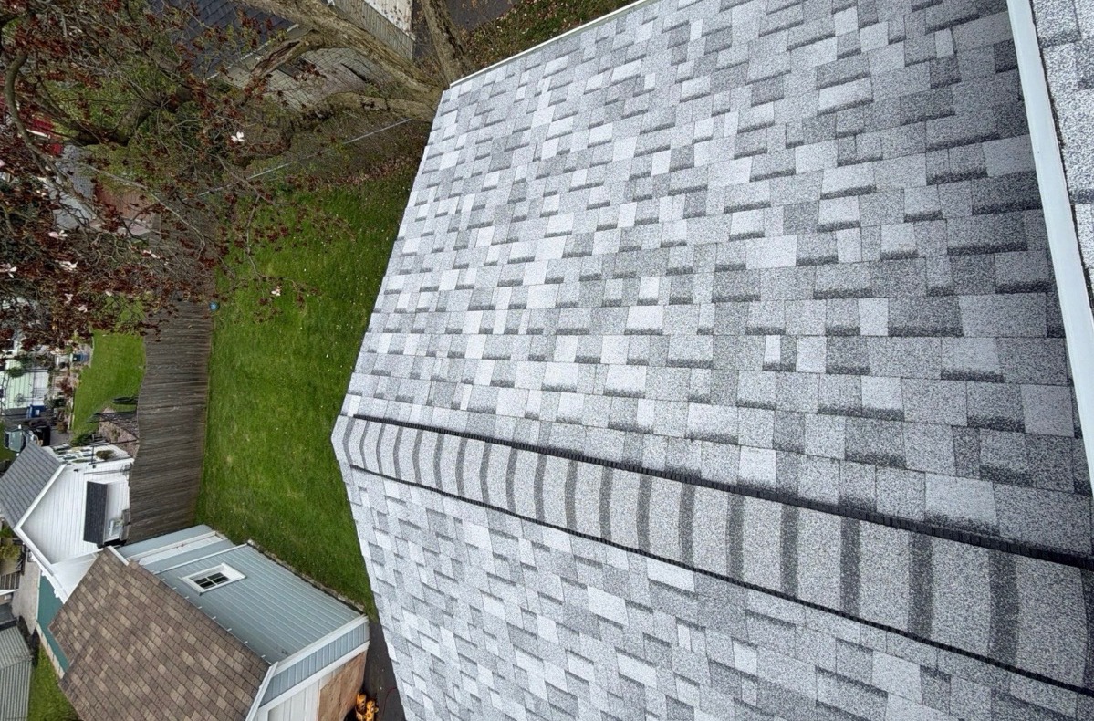 Finished B&G and Sons roof job 1 with clean shingle lines